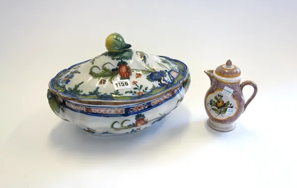 A Faenza (Ferniani) faience shaped oval two-handled tureen and cover, early 19th century, painted with flowering Oriental plants before terracing, the