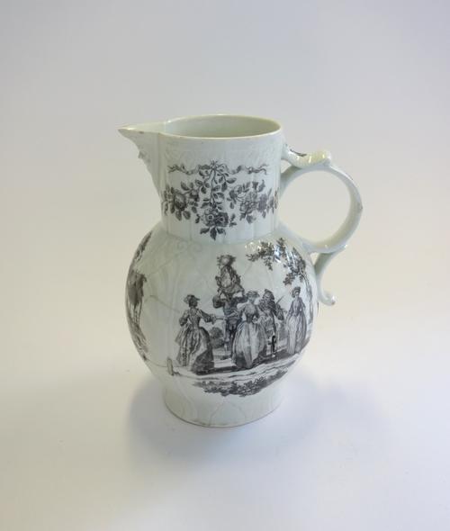 A Worcester cabbage leaf moulded mask jug, circa 1765-70. transfer printed in black with `Mayday', `Milkmaids' and `The Lovers', (a.f), 23cm.high.