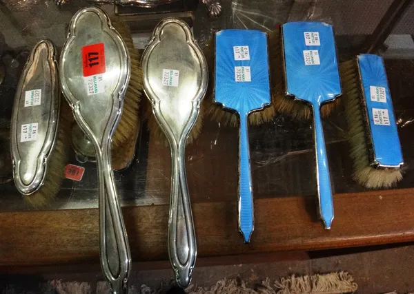 A group of silver mounted wares, to include; a three piece blue enamel brush set, Birmingham 1938, and a four piece silver mounted Art Nouveau brush s