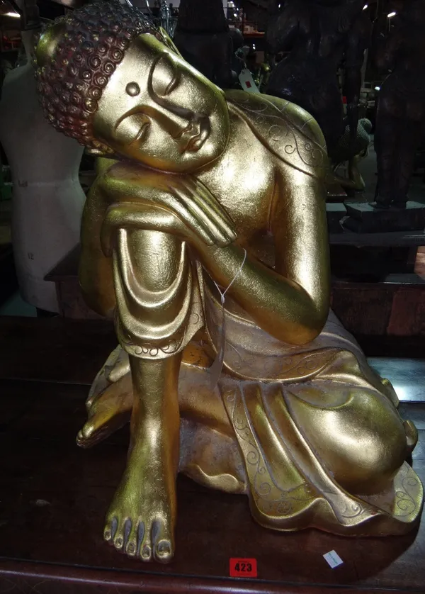 A 20th century gilt framed model of a resting Buddha.