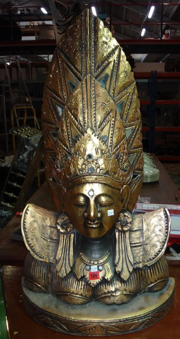 A large 20th century gilt wood carved bust of Buddha in a headdress.