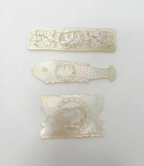 A group of Chinese engraved mother-of-pearl gaming counters, 19th century, comprising; 124 rectangular, 54 fish and 27 circular, (205).