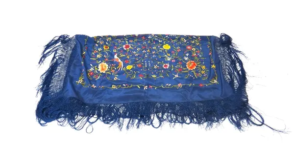 A Chinese blue ground silk wrap, 20th century, embroidered with birds amongst flowering branches, approx.92cm. by 86cm.excluding border; and a Chinese