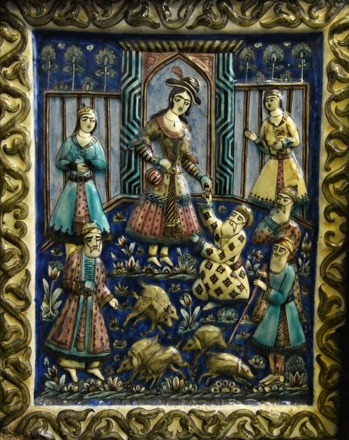 A large Qajar moulded rectangular tile, Persia, 19th century, depicting a scene from the mantiq al-tayr of `Attar', showing Sheikh San'a and the Chris