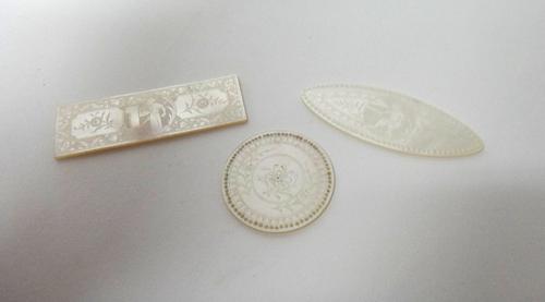 A large quantity of Chinese mother-of-pearl engraved gaming counters, 19th century,of various forms,  comprising; 108 fish, 114 rectangular, 95 lozeng