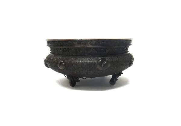 A Chinese bronze censer, probably 19th century, of compressed circular form, with leiwen ground, raised on four double gourd and leaf supports, charac