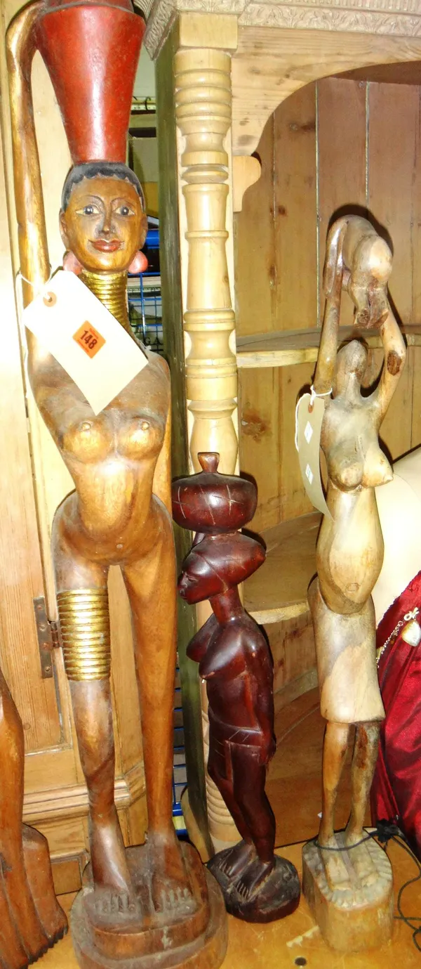 A group of three 20th century tribal style hardwood carved figures.