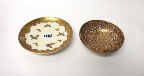 A Japanese Satsuma bowl, Meiji period, the interior painted with a profusion of close packed flowerheads, the exterior painted with insects beneath a