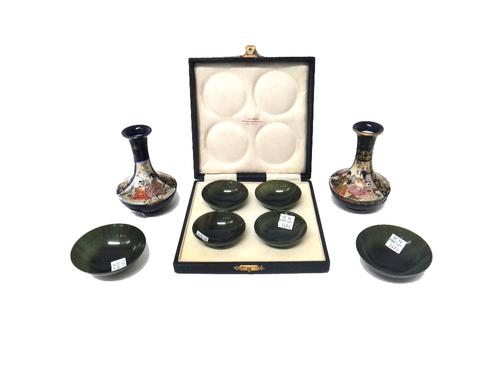 A pair of small Japanese Satsuma blue ground bottle vases, 20th century, painted with panels of women in a landscape, signed, 11cm high: together with