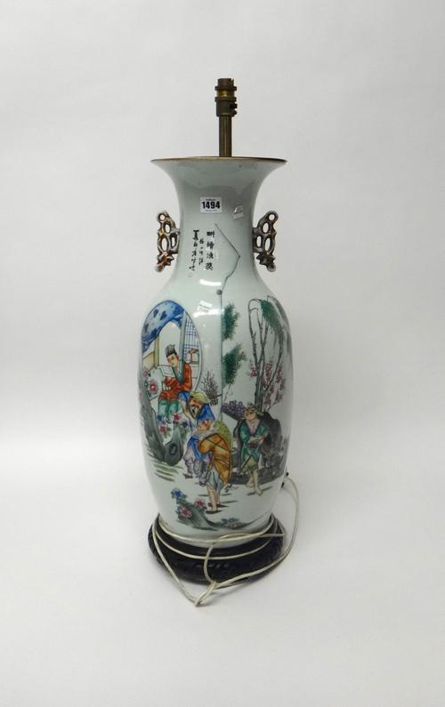 A large Chinese famille-rose two-handled baluster vase, 20th century, painted with four figures and a water buffalo, the reverse with calligraphy, 57c