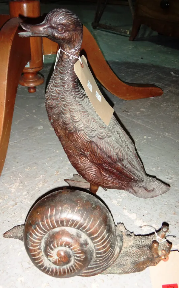 A 20th century bronze figure of a snail, together with a bronze figure of a duck.