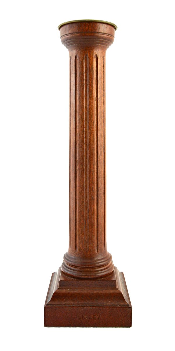 A 20th century David Linley mahogany candlestick, with fluted column and stepped square base, 30cm high.  Illustrated