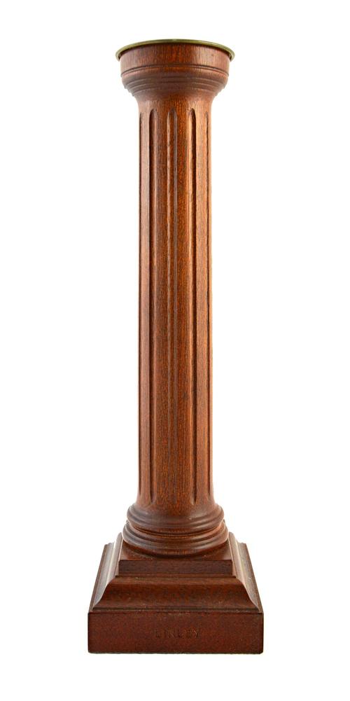 A 20th century David Linley mahogany candlestick, with fluted column and stepped square base, 30cm high.  Illustrated
