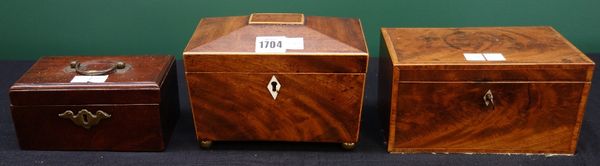 A small Regency mahogany sarcophagus tea caddy, 19cm wide, and two George III mahogany rectangular tea caddies, 20cm and 17cm wide (3).