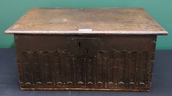 A 17th century oak bible box with carved front panel and chip work decoration, 65cm wide.