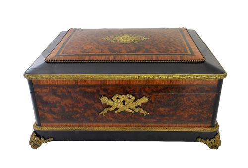 A Napoleon III ormolu mounted and brass inlaid burr walnut and kingwood casket by Charles Guilleaume Diehl (1811-1833) with a brass and mother of pear