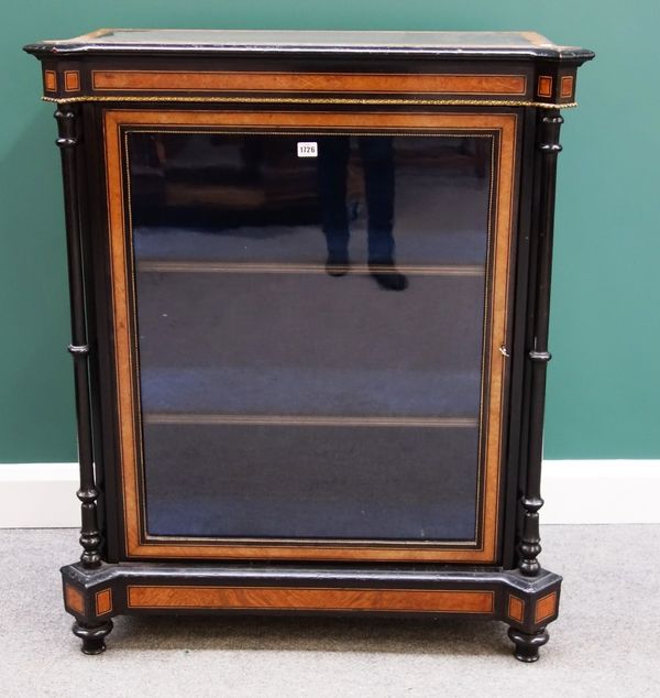 A Victorian figured walnut and ebonised gilt metal mounted pier cabinet on turned feet, 90cm wide.