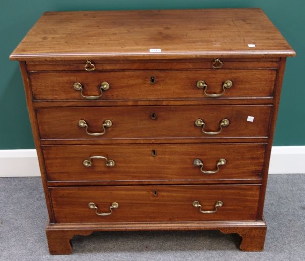 A George III mahogany chest of drawers, the brushing slide over four long graduated drawers, on bracket feet, 84cm wide.