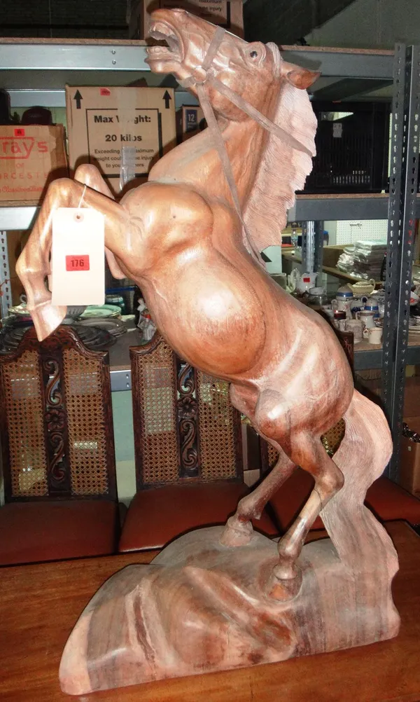 A 20th century hardwood model of a rearing horse.