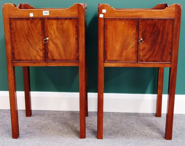 A pair of mid 18th century style mahogany tray top two door night stands on square supports, each 46cm wide.