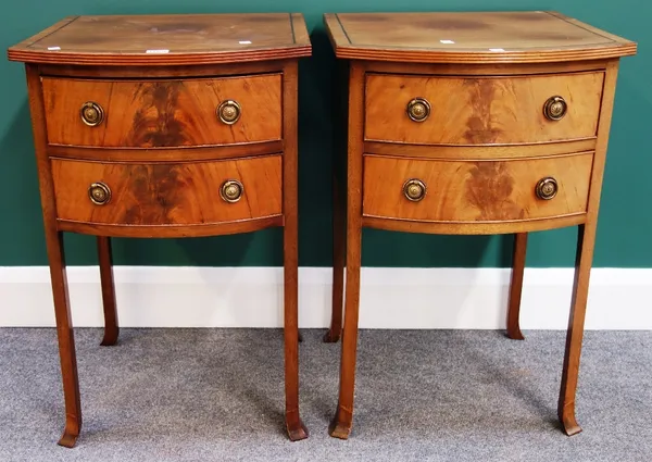A pair of mahogany bowfront bedside tables, each with pair of frieze drawers on splayed supports, 46cm wide.