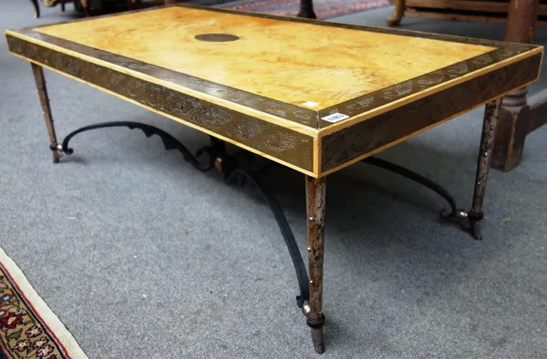 A 20th century wrought iron copper and silvered metal figural ash rectangular coffee table, 120cm wide.
