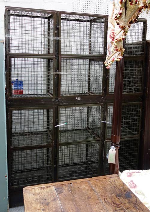 A 20th century wirework free standing twelve cupboard locker cabinet, 152cm wide x 203cm high.