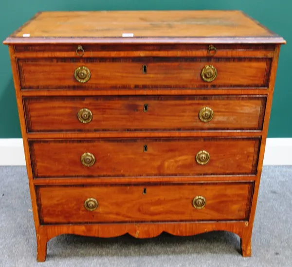 A George III rosewood banded satinwood chest, the brushing slide over four long graduated drawer on splayed bracket feet, 81cm wide.