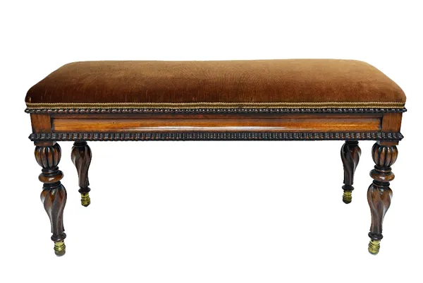 A 19th century French rosewood framed rectangular lift top piano stool on spiral fluted supports, 96cm wide.  Illustrated
