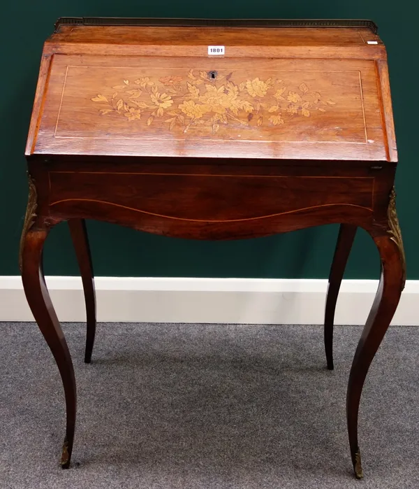 A Louis XV style marquetry inlaid rosewood gilt metal mounted bureau de dame, on cabriole supports, 72cm wide.