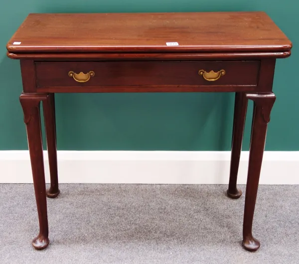 A mid 18th century mahogany tea table with frieze drawer on pad feet, 79cm wide.
