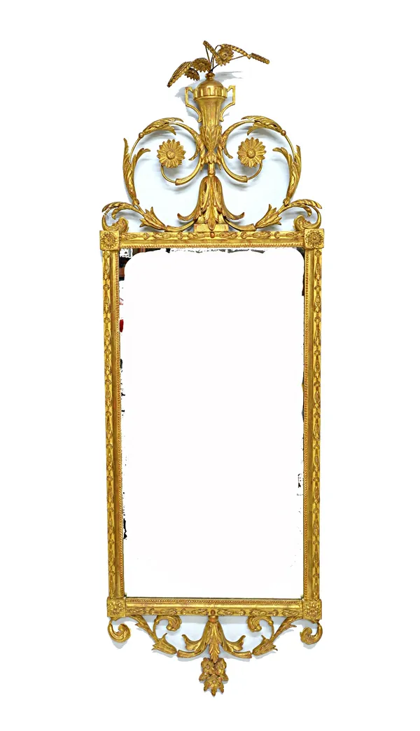 A 19th century French gilt framed wall mirror with floral urn mounted crest above the two part mirror plate and scroll lower frieze, 57cm wide x 170cm