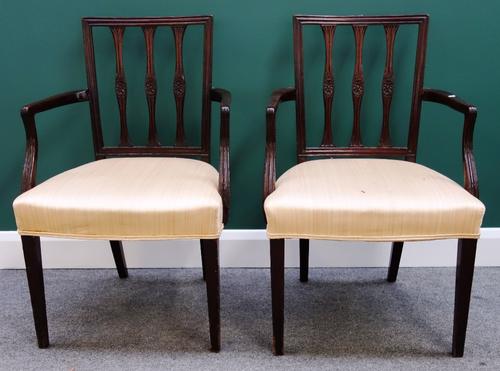 A pair of 19th century mahogany square back open armchairs, with bow seats on tapering square supports.