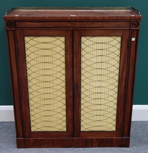 A Regency mahogany side cabinet, the brass galleried top over a pair of grille doors, on plinth base, 83cm wide.