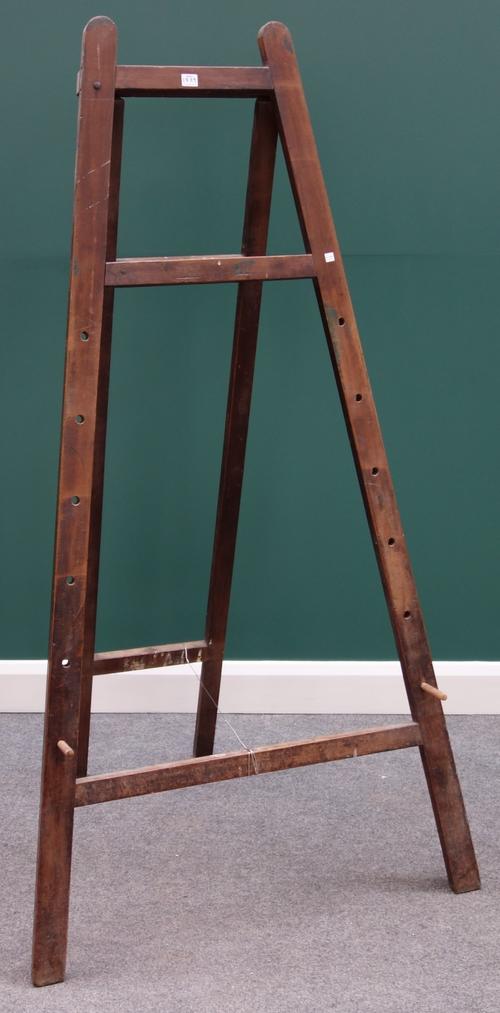 A large early 20th century stained beech 'A' frame artist's easel, 95cm wide x 178cm high.