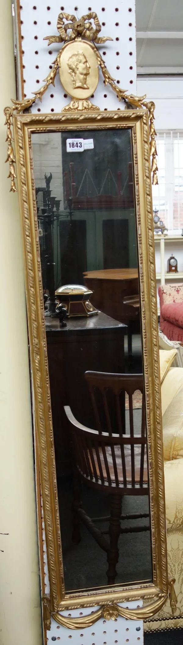 A pair of 20th century gilt framed rectangular wall mirrors with ribbon tied Romanesque portrait tables over mirror plate and swag lower frieze, 29cm