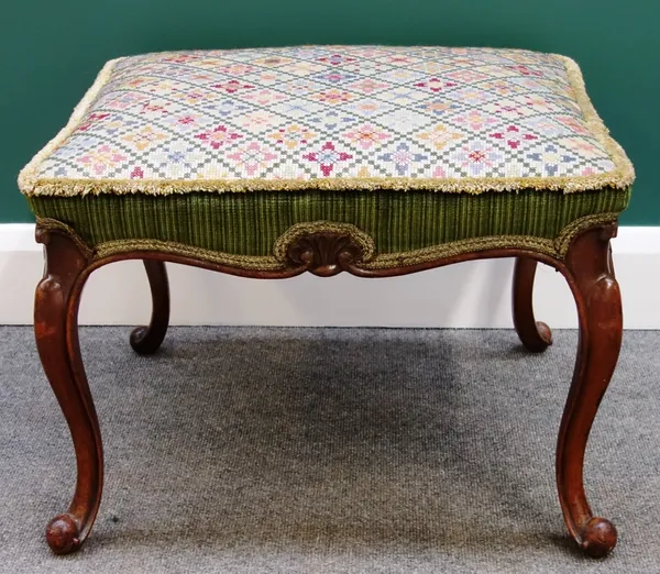 A late 19th century mahogany framed square footstool, with shell carved frieze on cabriole supports, 57cm wide.