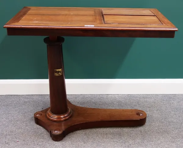 A Victorian rosewood bed reading table, with double angle reading platform and height adjustable column, 95cm wide.