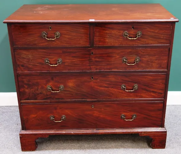 A George III mahogany chest of two short and three long graduated drawers, on bracket feet, 113cm wide.