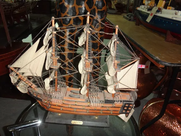 A 20th century model of a Spanish galleon, together with another model ship.