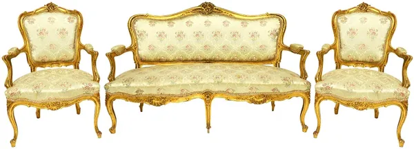 A late 19th century gilt framed Louis XV style five piece salon suite to comprise sofa,153cm wide, and four chairs.   Illustrated