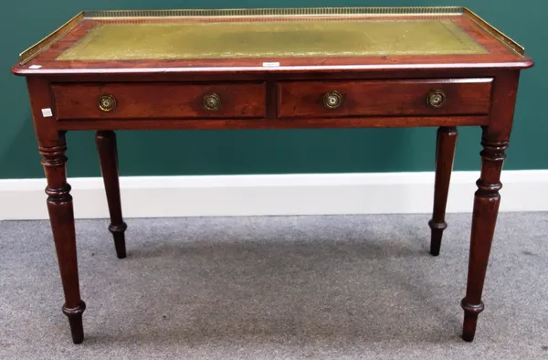 A Victorian mahogany writing table, the three quarter brass galleried back over a pair of frieze drawers, on tapering turned supports, 107cm wide.