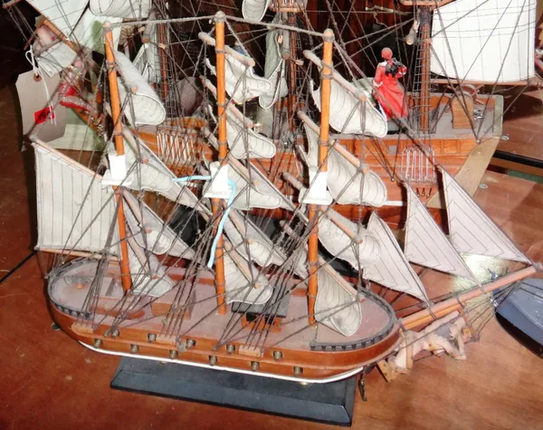 A 20th century wooden model of H.M.S Pinafore, together with a model of The Mayflower.