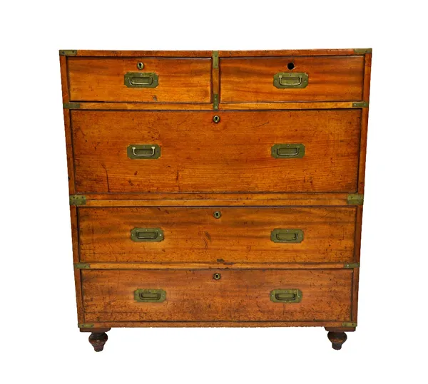 A 19th century brass bound two part campaign desk of two short and three long drawers on turned feet, 99cm wide.   Illustrated