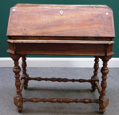 A late 17th century Italian inlaid walnut bureau on stand, with welled interior and turned supports (a.f.), 93cm wide.