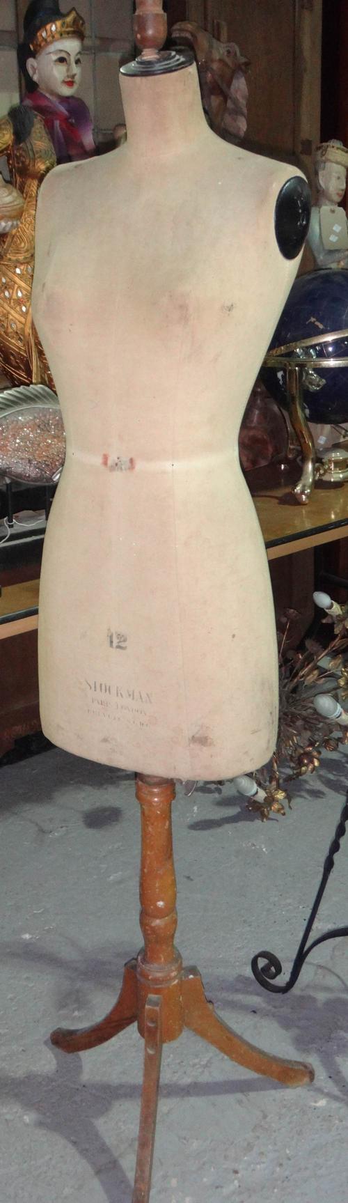A Stockman tailor's dummy on a tripod base.