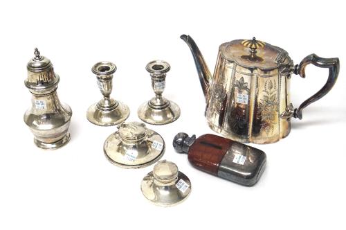 Silver and silver mounted wares, comprising; a sugar caster, Birmingham 1935, two circular capstan shaped ink stands, a pair of squat candlesticks and