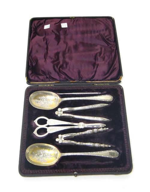 Victorian and later plated and metal wares, comprising; a pair of serving spoons, two nut crackers, a pair of grape scissors and one nut pick, a pair
