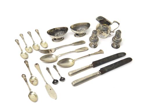 Silver, comprising; a small milk jug, Birmingham 1895, a pair of oval salts, having fluted decoration, London 1895, a pair of pepperettes, Chester 189