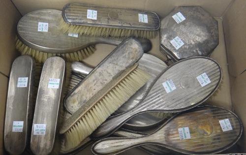 A silver octagonal hinge lidded trinket box, raised on four feet, Birmingham 1919 and silver mounted dressing table wares, comprising; two hand mirror